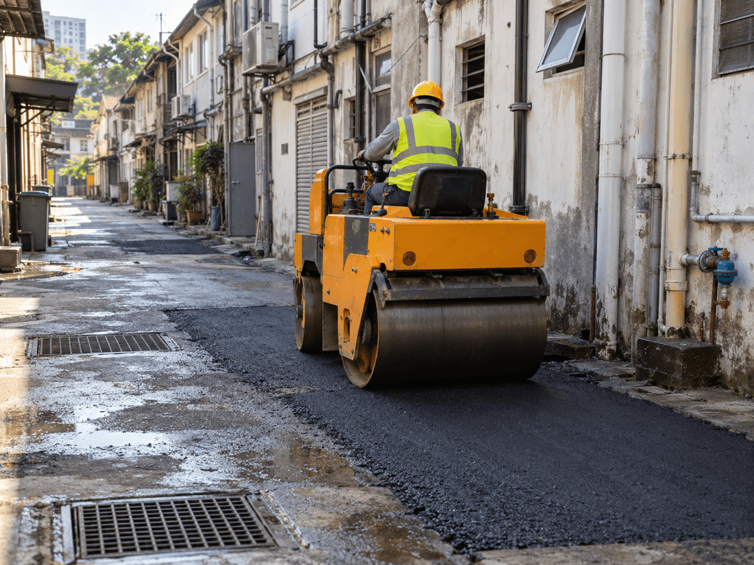 Compacting an Asphalt Patch in a Back Lane